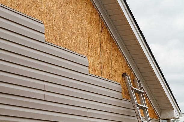 Professional Siding Contractor technician working in Hudson, NY